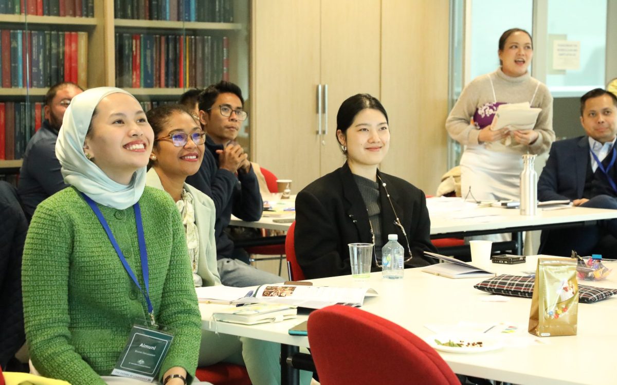 Participants in the Future of Leadership program (2-8 August 2024). A group of young leaders from Asia backgrounds sitting in a room.