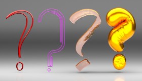 Graphic design of four question marks. Ask a Curator